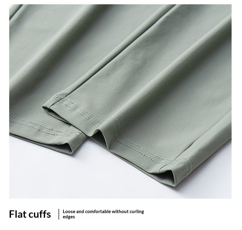 Light green ice silk antibacterial casual sweatpants with flat cuffs smooth fabric finish and neat edge stitching.