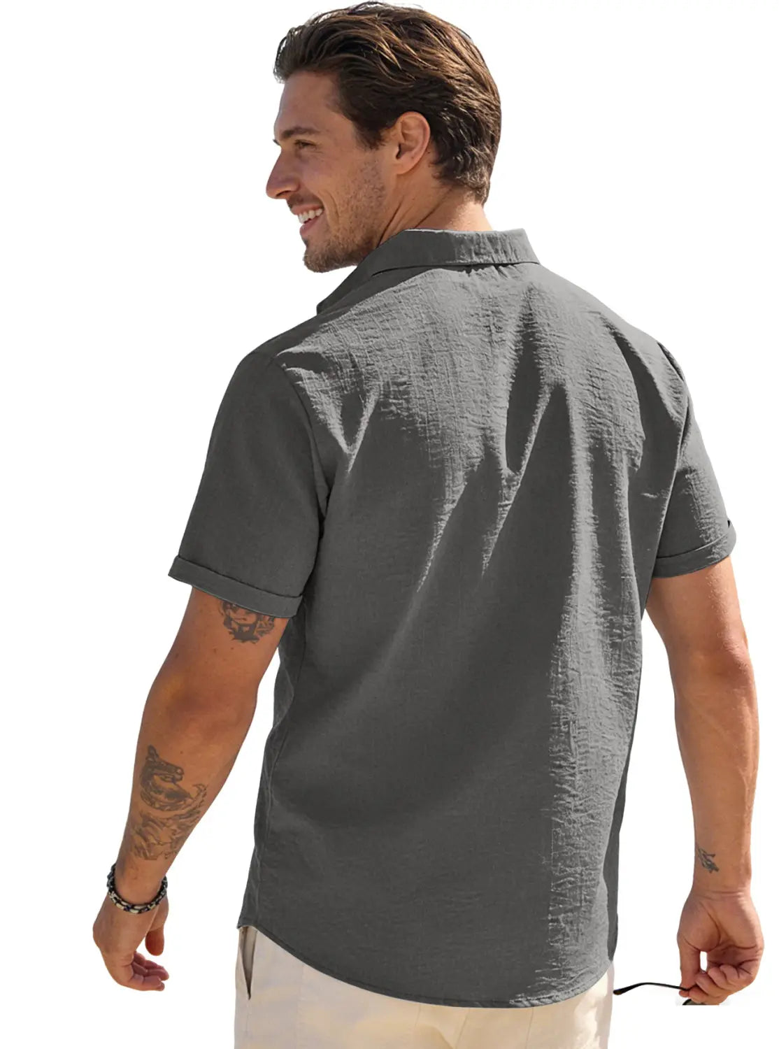 Men’s dark gray short-sleeved button-up shirt made of textured bamboo linen fabric with rolled cuffs.