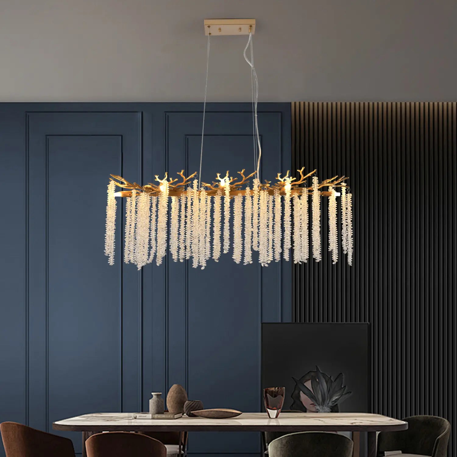 39 inch golden crystal waterfall pendant light featuring a gold-toned antler chandelier design with cascading white crystal strands.