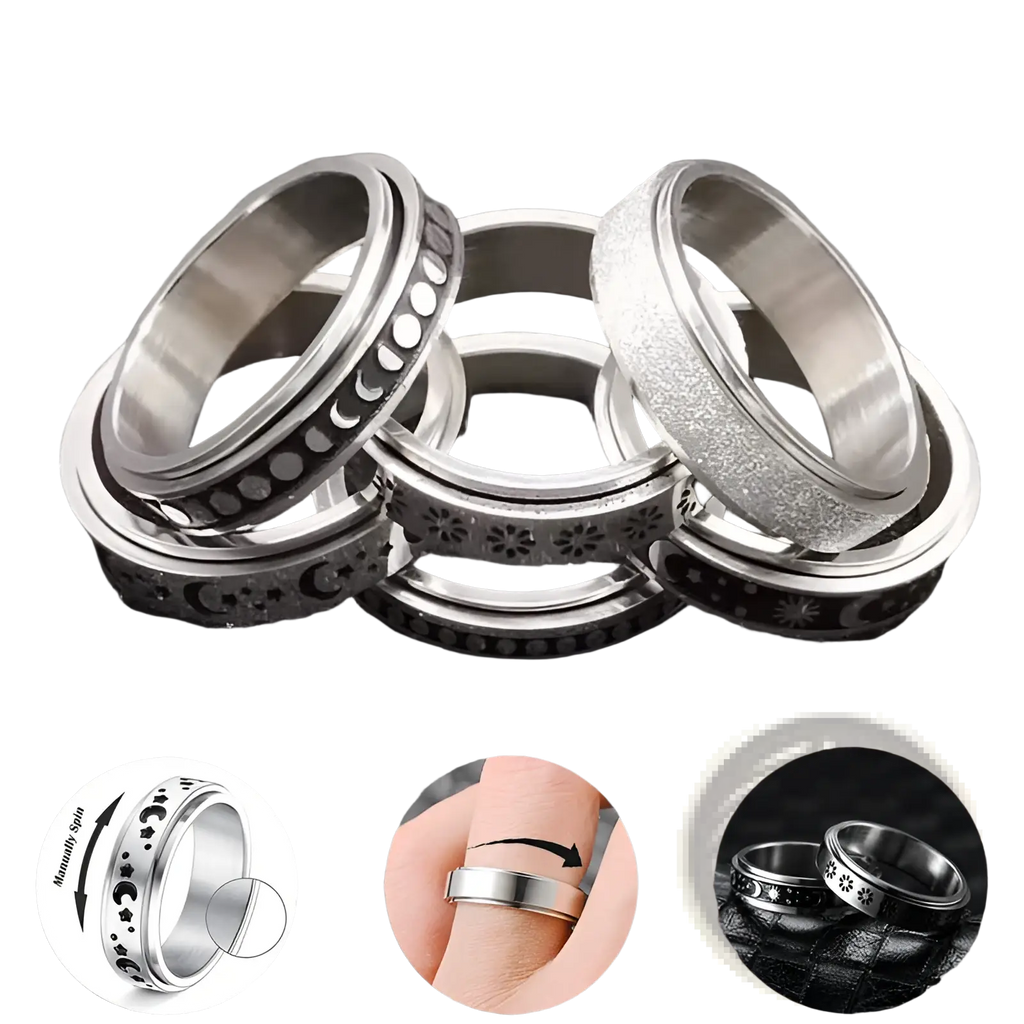 Silver-toned stainless steel celestial spinner rings with moon and star engravings for anxiety relief