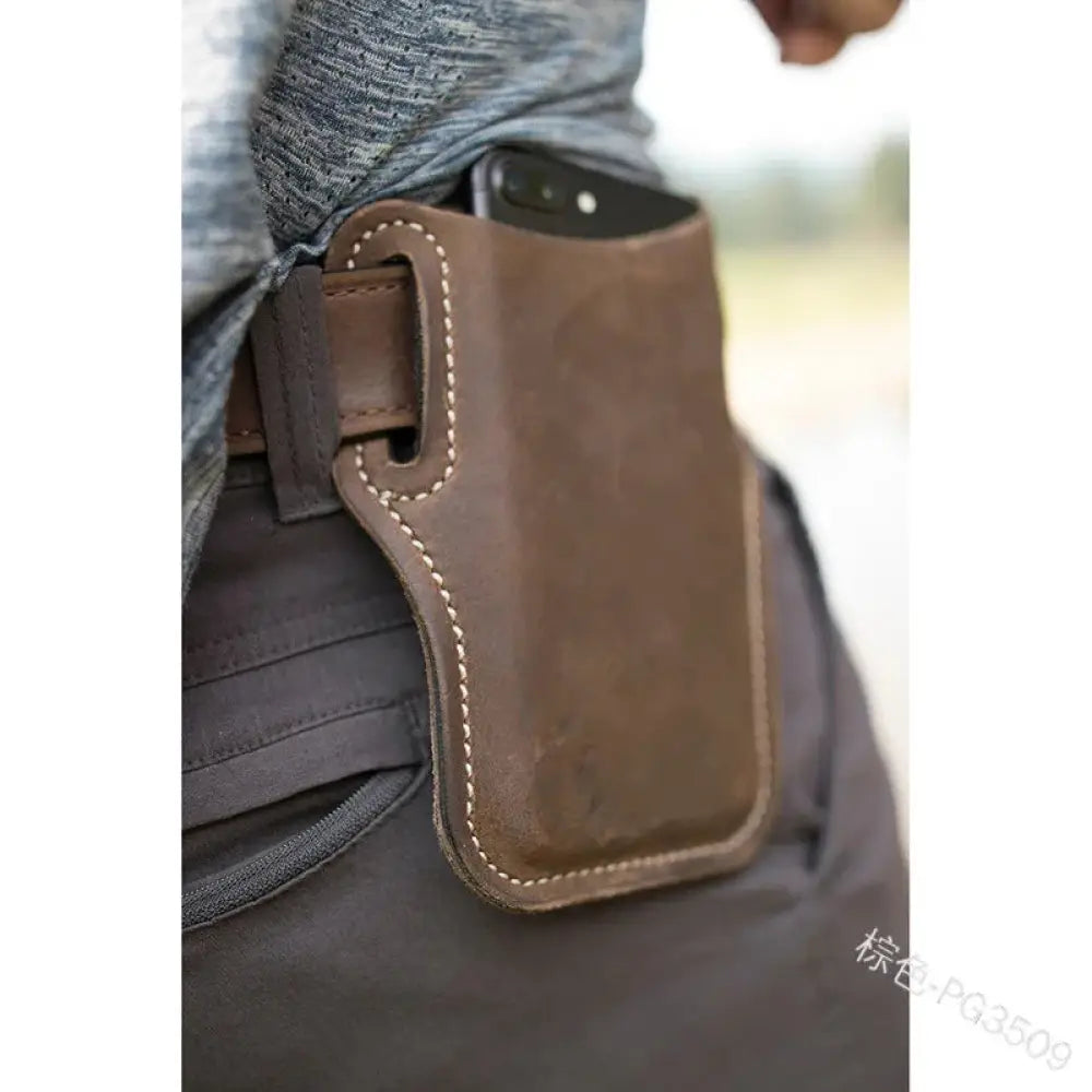 Brown pu leather phone holster with belt loop card slots back side showing visible stitching and belt clip