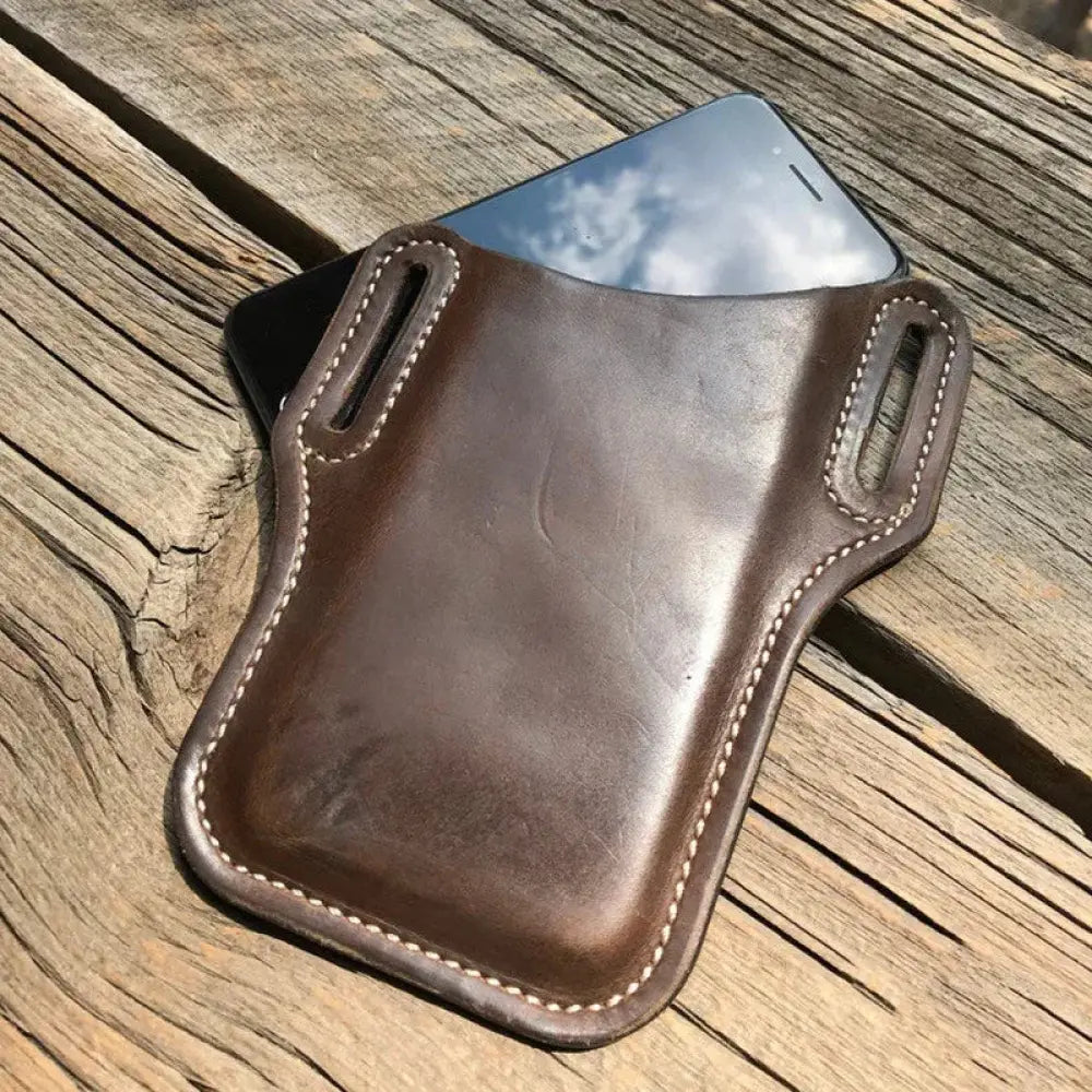 Brown pu leather phone holster with white stitching showing back side with belt loop and two side loops