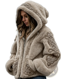 Beige faux fur zip hoodie featuring a hood and intricate darker beige celtic knot embroidery detailing