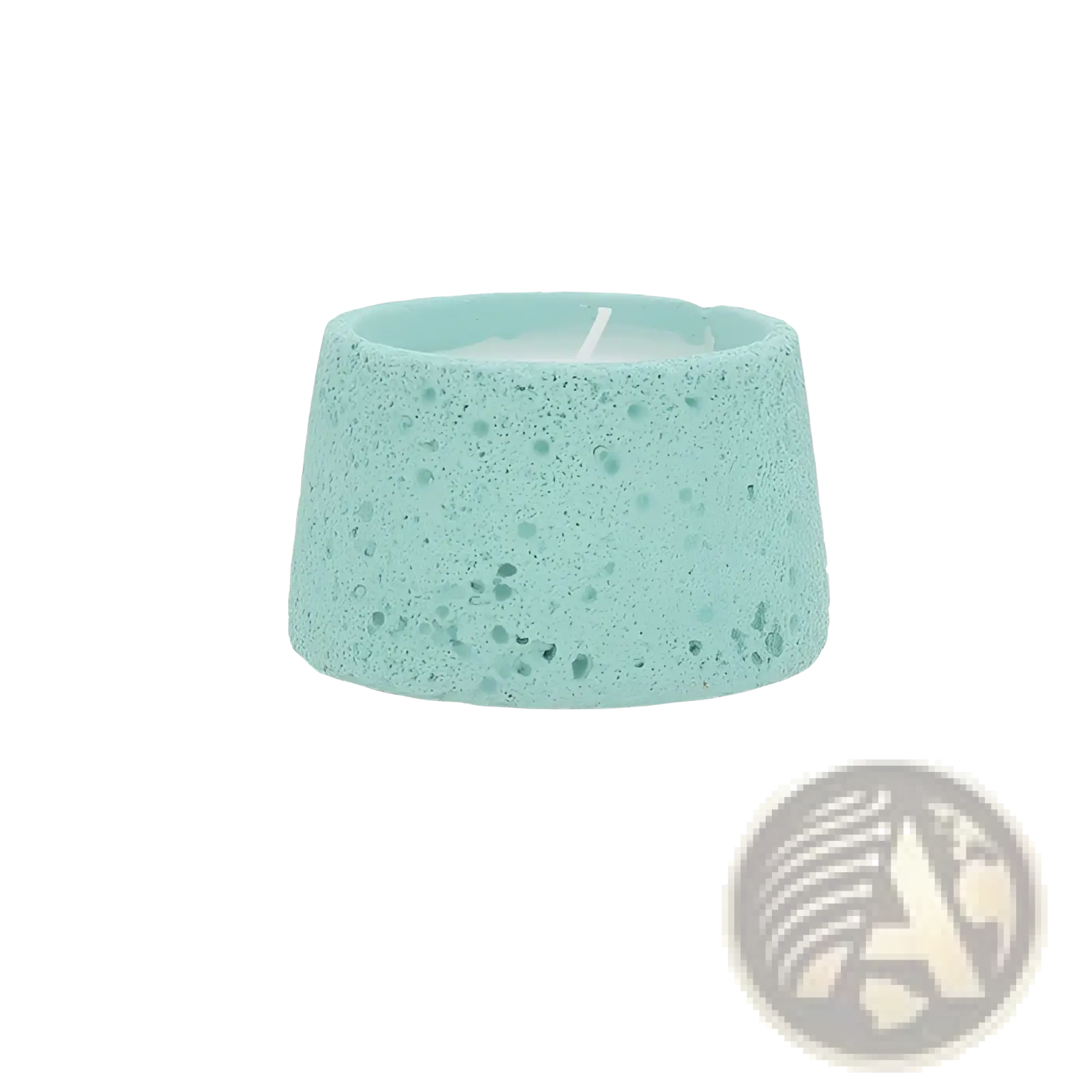 A light blue speckled concrete cement candle holder with textured surface and a white wax candle inside for aromatherapy