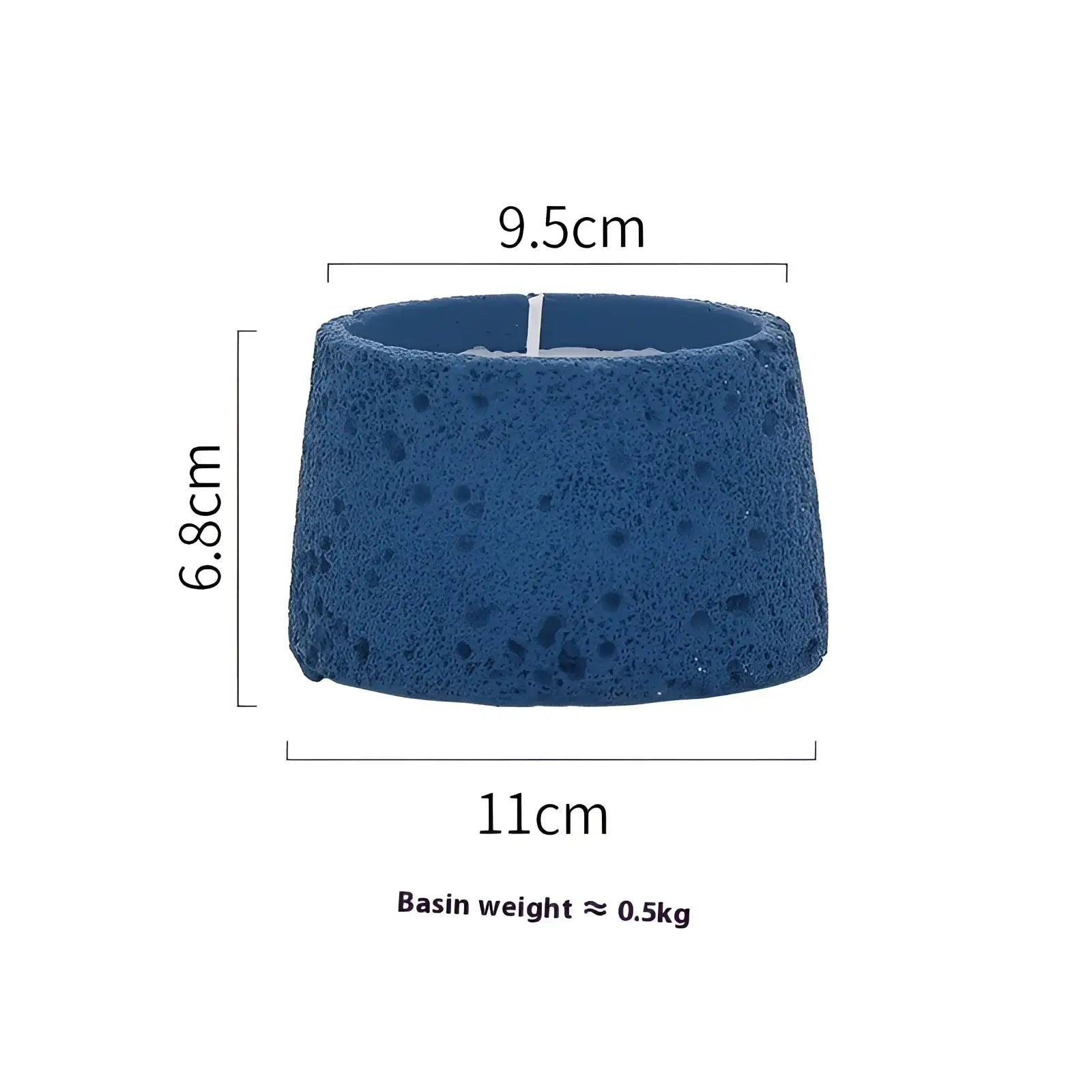 Blue porous ceramic cement candle holder with textured speckled surface and tapered cylindrical shape for aromatherapy use