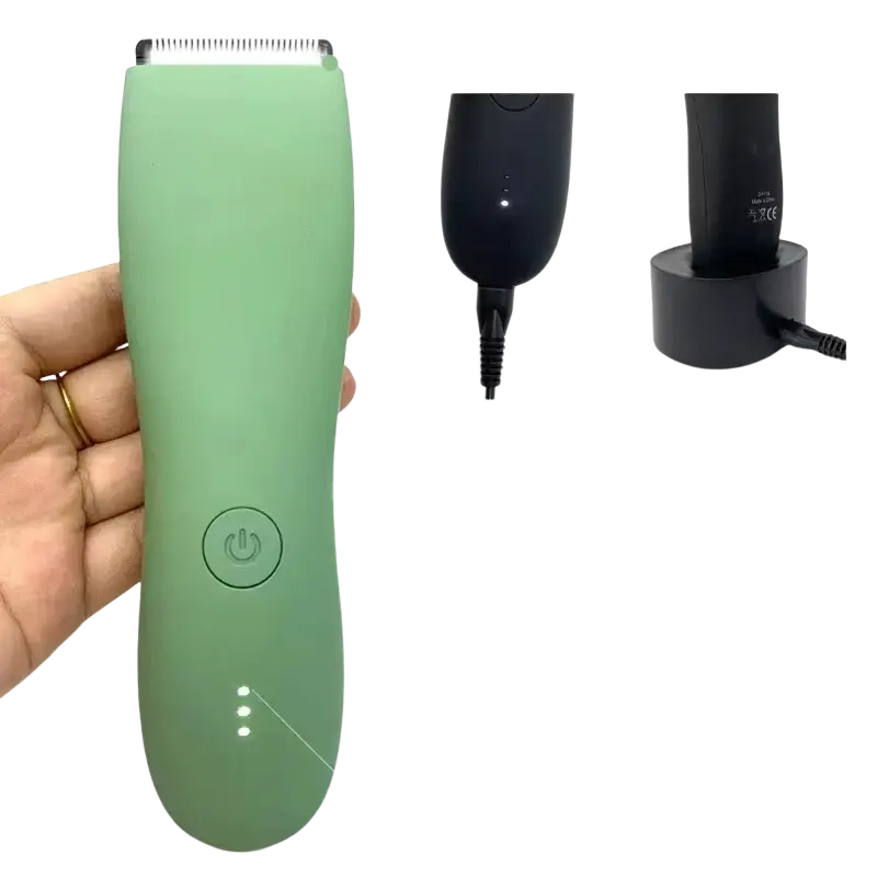 A sleek matte green ceramic blade body hair trimmer with rounded handle and three indicator lights at the base