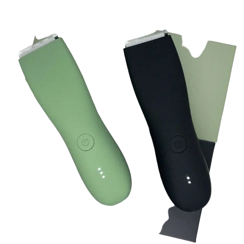 Two ceramic blade body hair trimmers in matte sage green and glossy black with silver cutting heads and power buttons