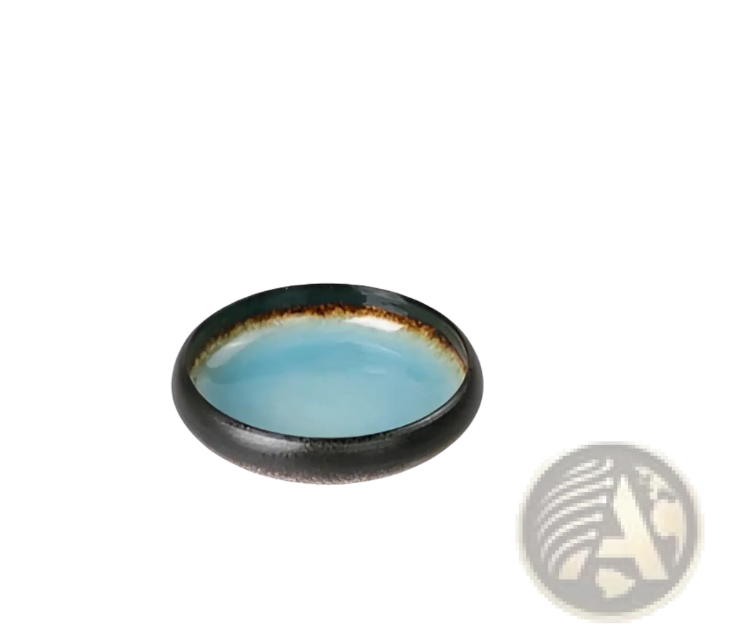 A sleek 12cm ceramic bowl with glossy turquoise interior and dark earthy-toned rim kiln glazed bone china round plate