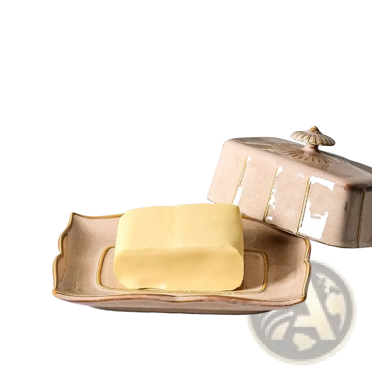 A beige ceramic butter dish with gold trim and matching lid featuring an ornate roof-like knob on top