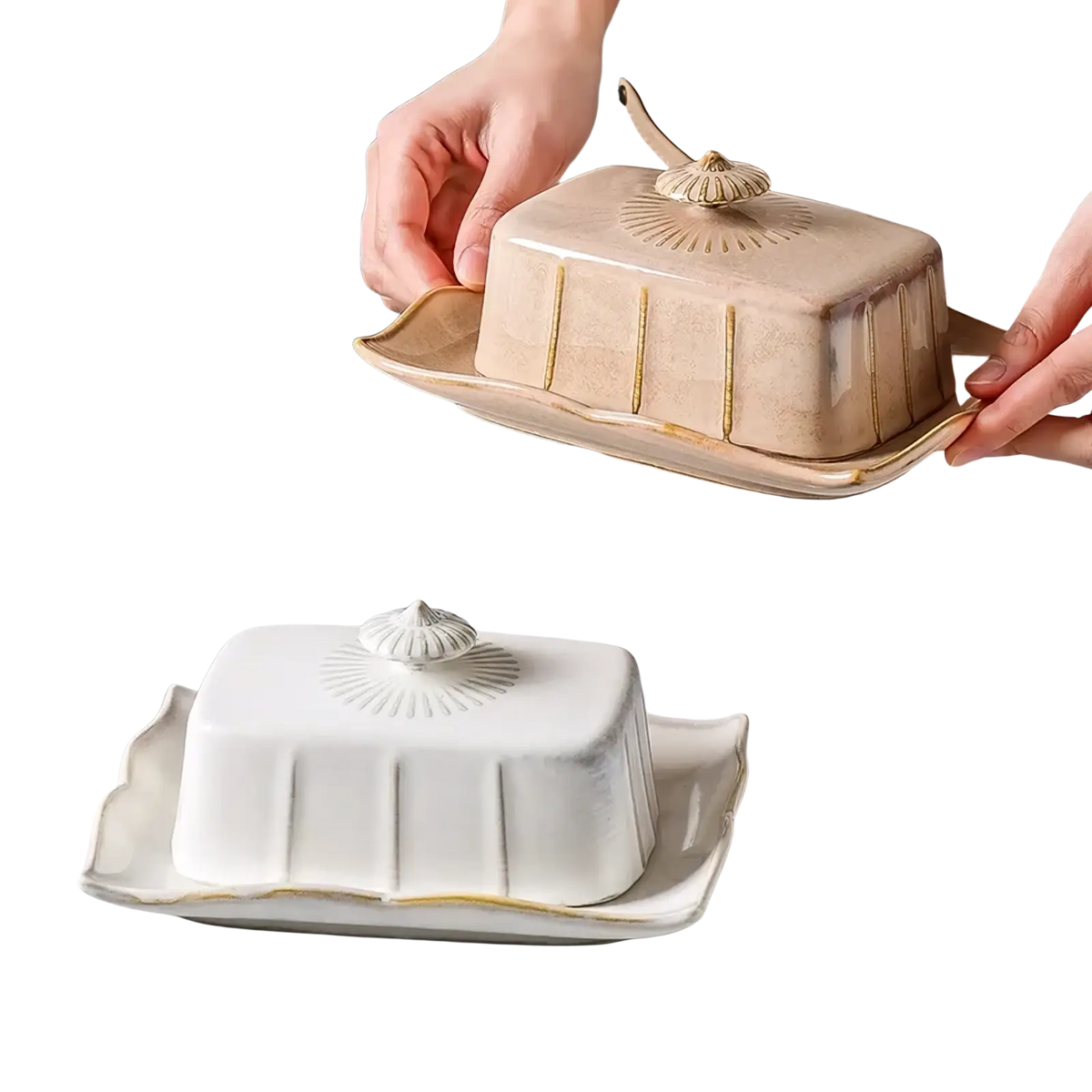 Beige ceramic butter dish with gold trim and scalloped edges featuring a decorative shell-shaped knob on the lid