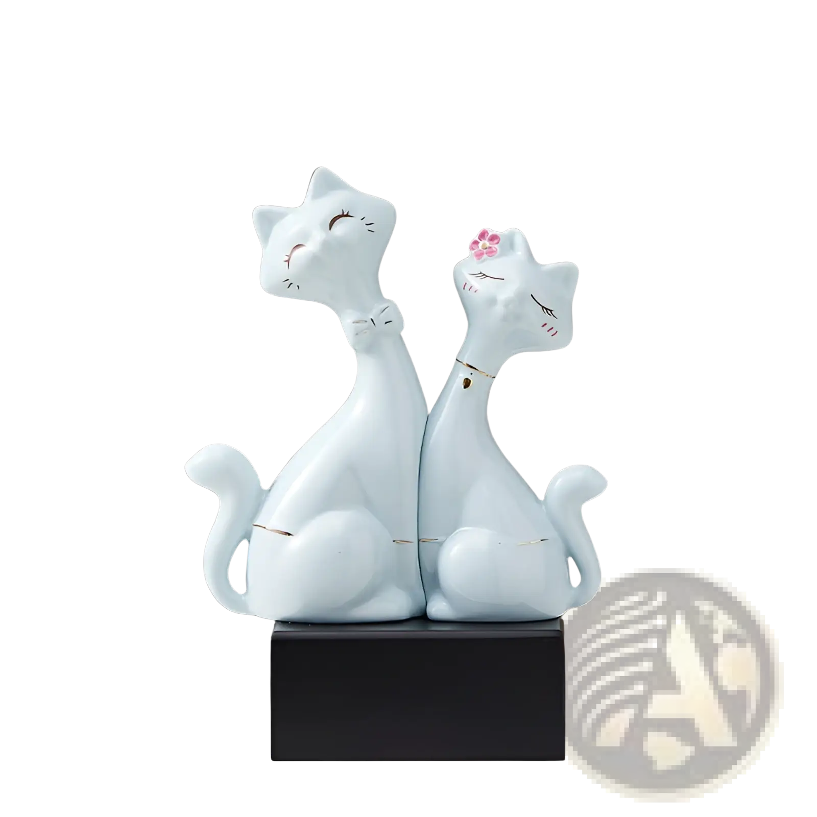 Light blue ceramic figurine of two stylized cats sitting side by side on a black base for modern home decor