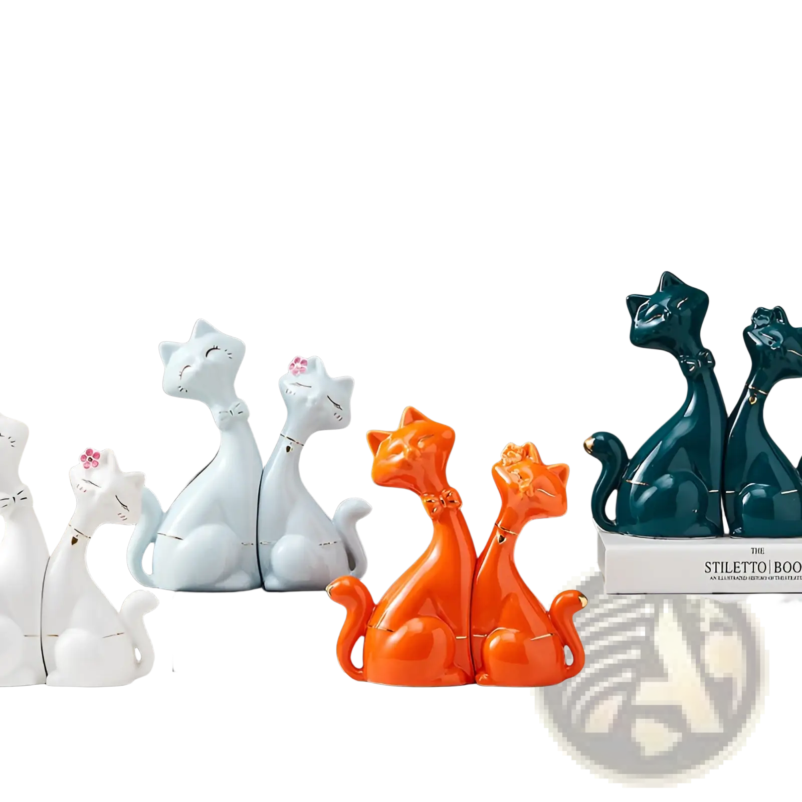 Vibrant orange ceramic cat figurines with glossy finish and delicate bow ties for modern gold and white home decor
