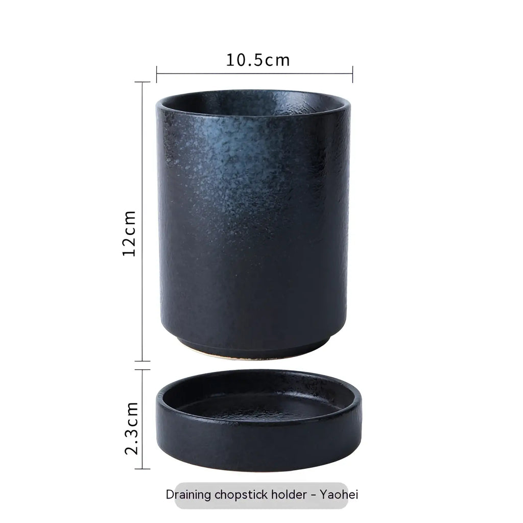 Black ceramic Japanese style chopstick holder with speckled texture and matching circular draining base for storage