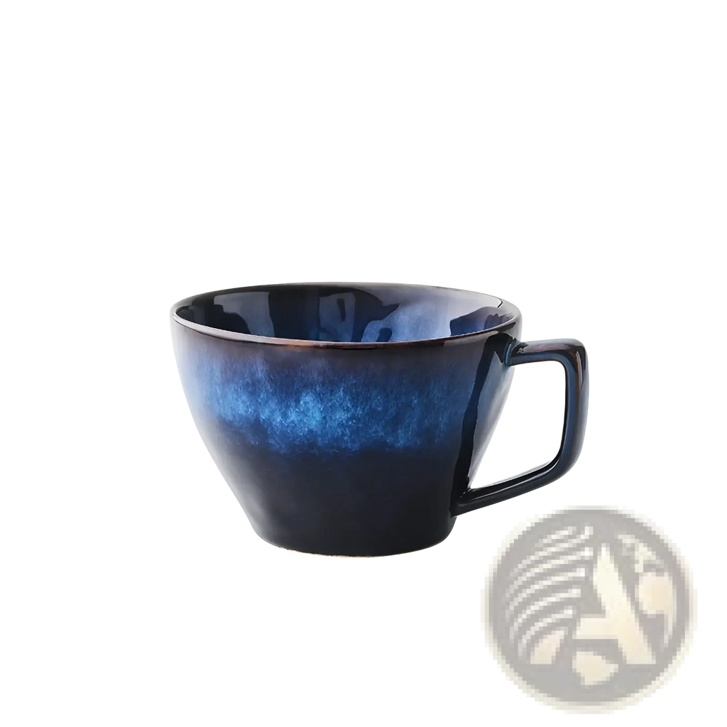 Ceramic coffee mug and saucer set in deep blue glaze with a glossy gradient finish and sturdy handle
