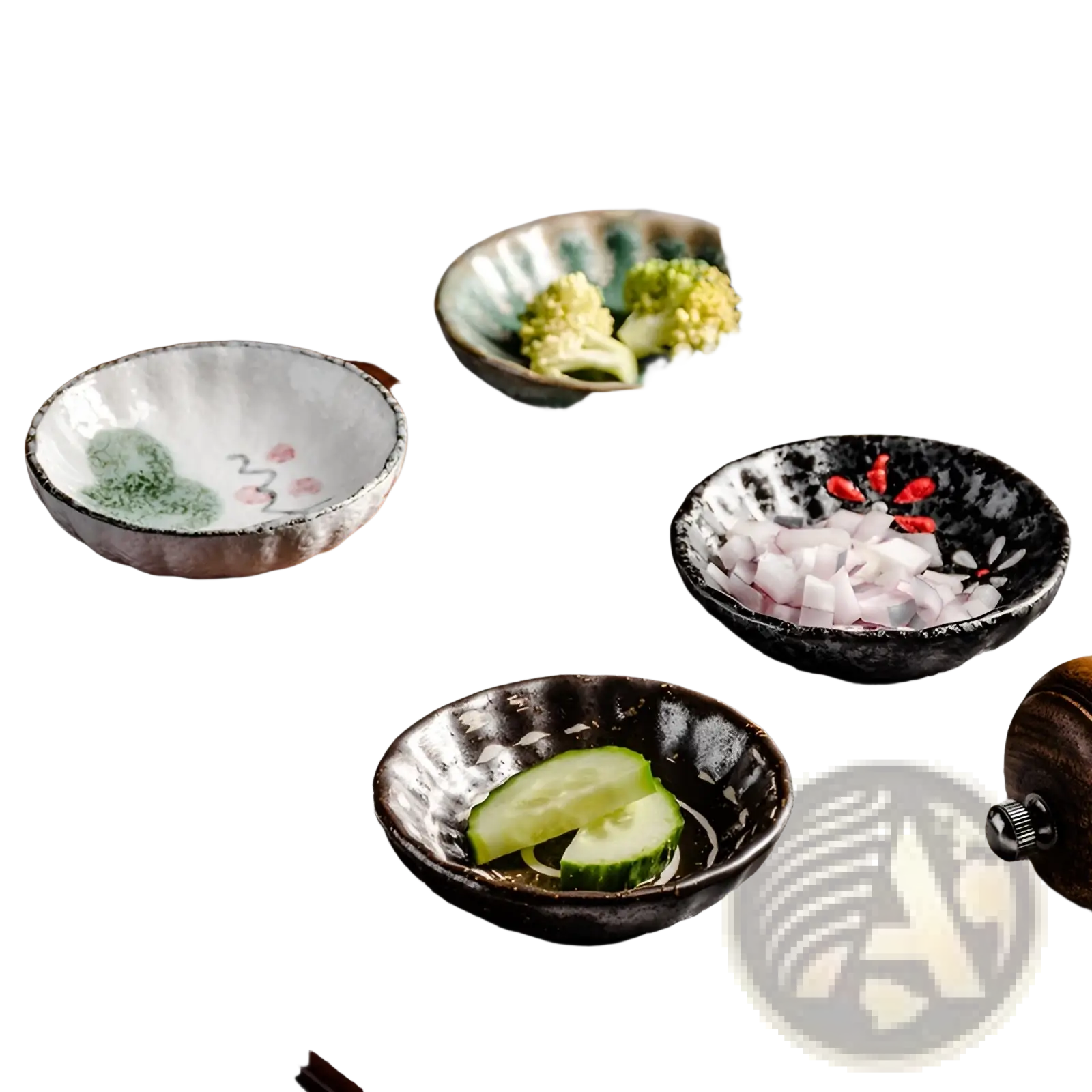 Handcrafted ceramic condiment bowls in earthy tones with subtle hand-painted designs and rustic textured finish
