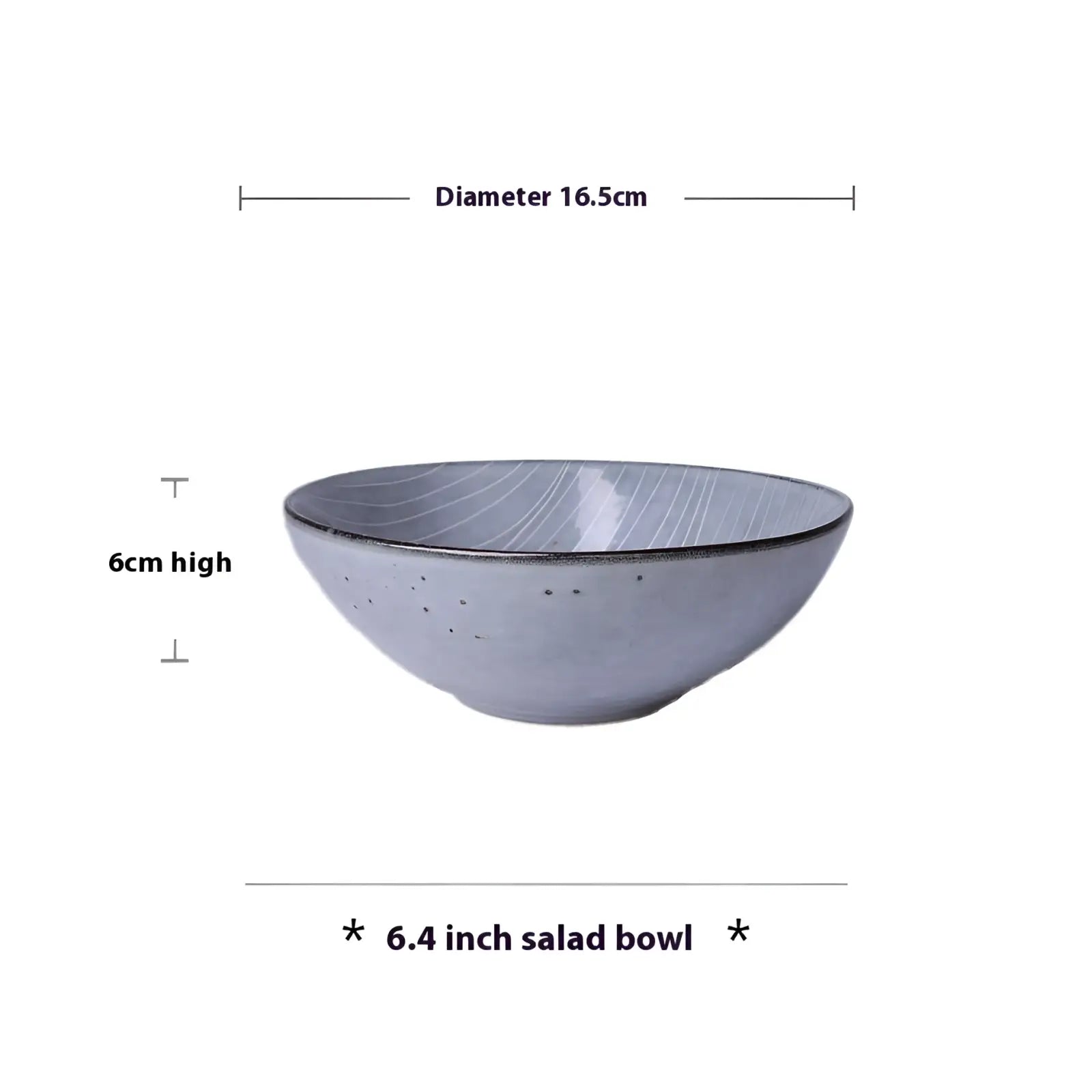 A matte gray ceramic salad bowl with subtle radial lines and speckles from the ceramic dinnerware set retro ribbed plates and bowls