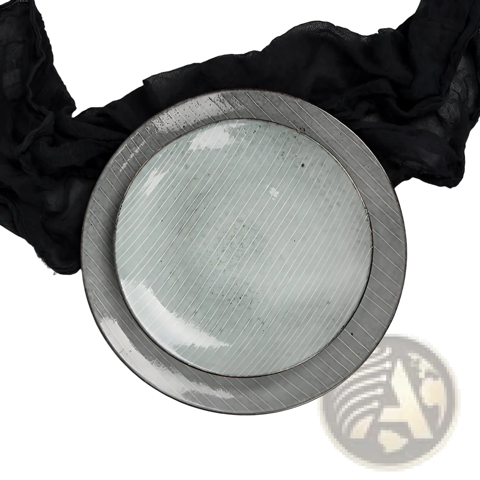 A pair of ceramic dinnerware plates with matte light green centers and silver-toned diagonally striped rims