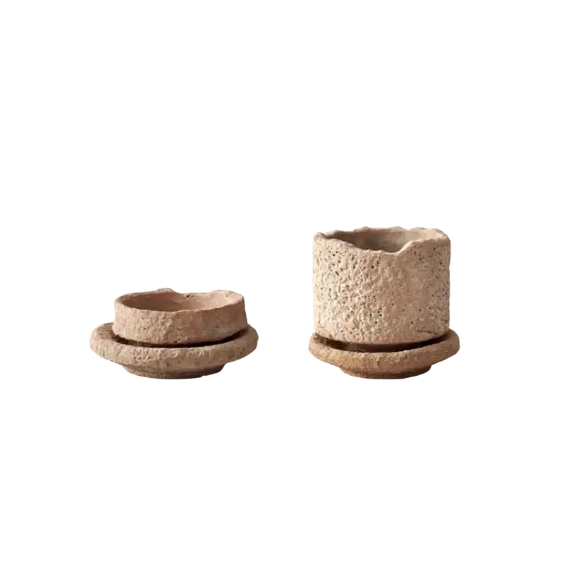 Earth-toned handmade ceramic flower pot with tray by zizi fish featuring textured finish for green plant display
