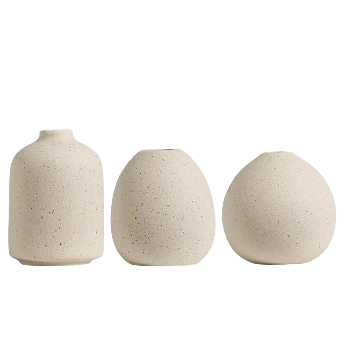 Set of three beige speckled ceramic flower vases with rounded organic shapes for boho tabletop decor