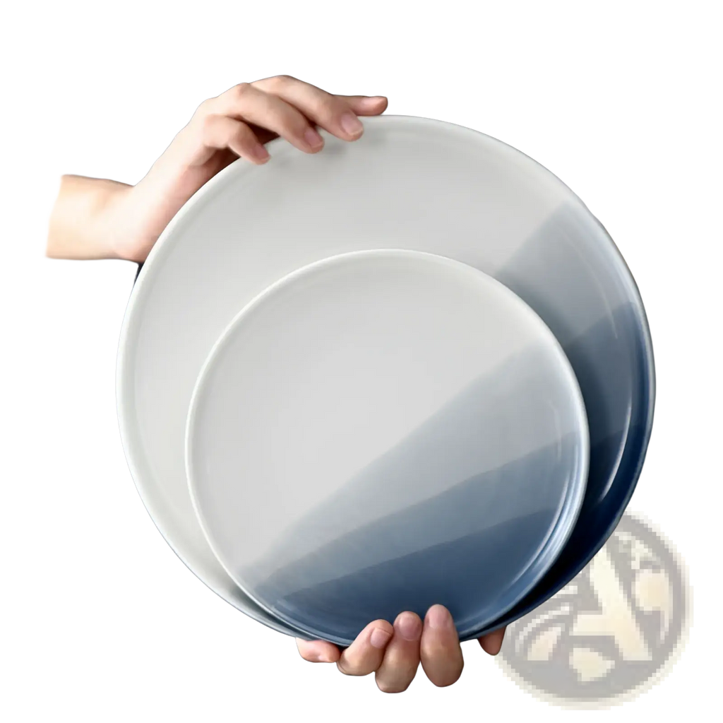 Set of two ceramic gradient blue steak plates with a smooth finish transitioning from white to deep blue