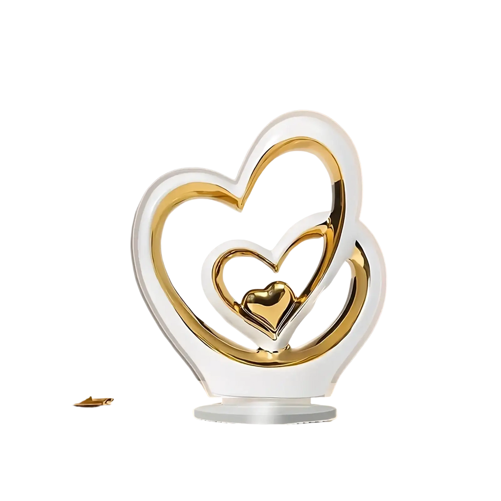 A sleek modern heart-shaped ceramic sculpture with nested gold and white acrylic layers for luxury decor
