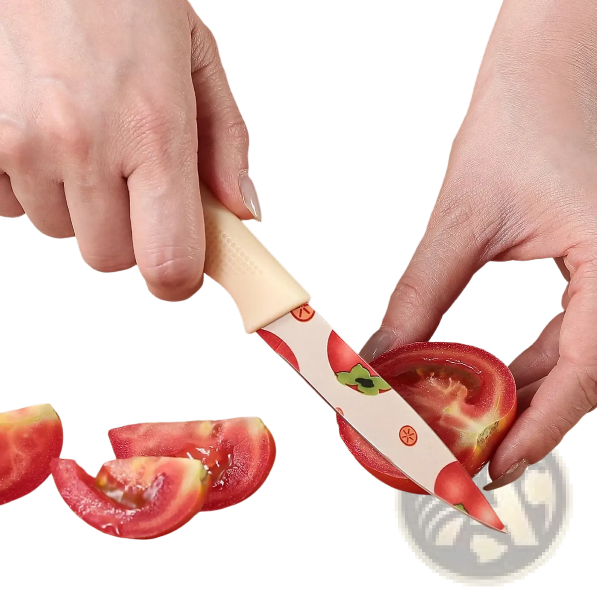 Beige-handled ceramic kitchen knife with white blade featuring red tomato and green leaf patterns for slicing