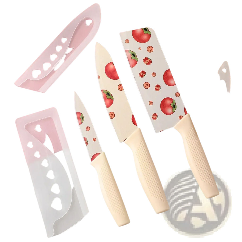 Set of three ceramic kitchen knives with tomato pattern blades and cream textured handles with white heart sheaths