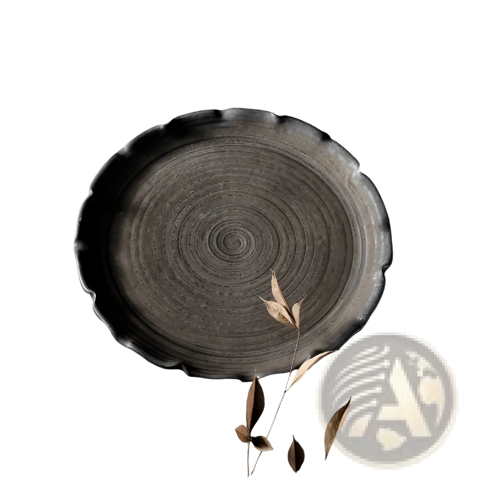 A dark gray handcrafted ceramic lace fruit plate with scalloped edges and concentric circular ridges for dim sum