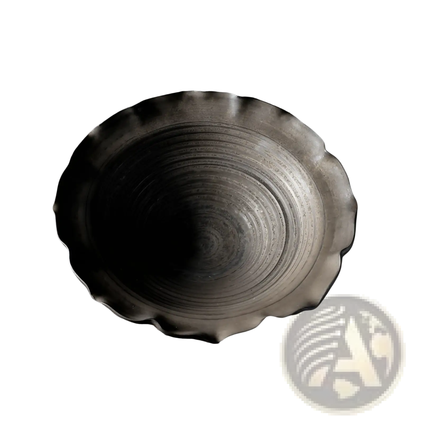 A dark handcrafted ceramic lace fruit plate with a scalloped rim and concentric circular ridges for dim sum