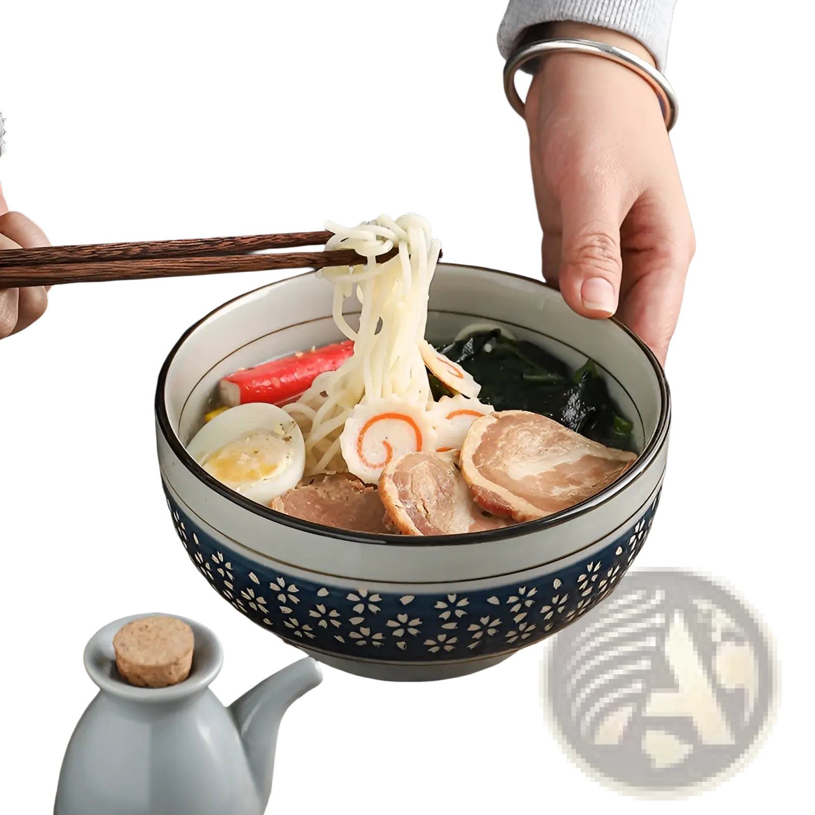Blue and white ceramic noodle bowl with cherry blossom floral pattern perfect for serving ramen or soup