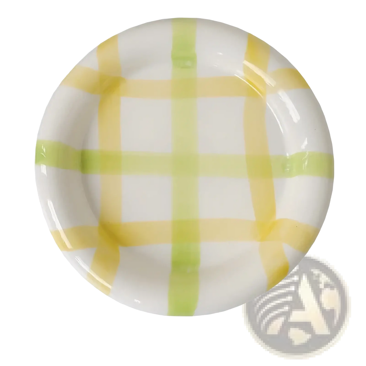 A round ceramic plate with glossy white surface and yellow light green plaid stripes for decorative kitchenware