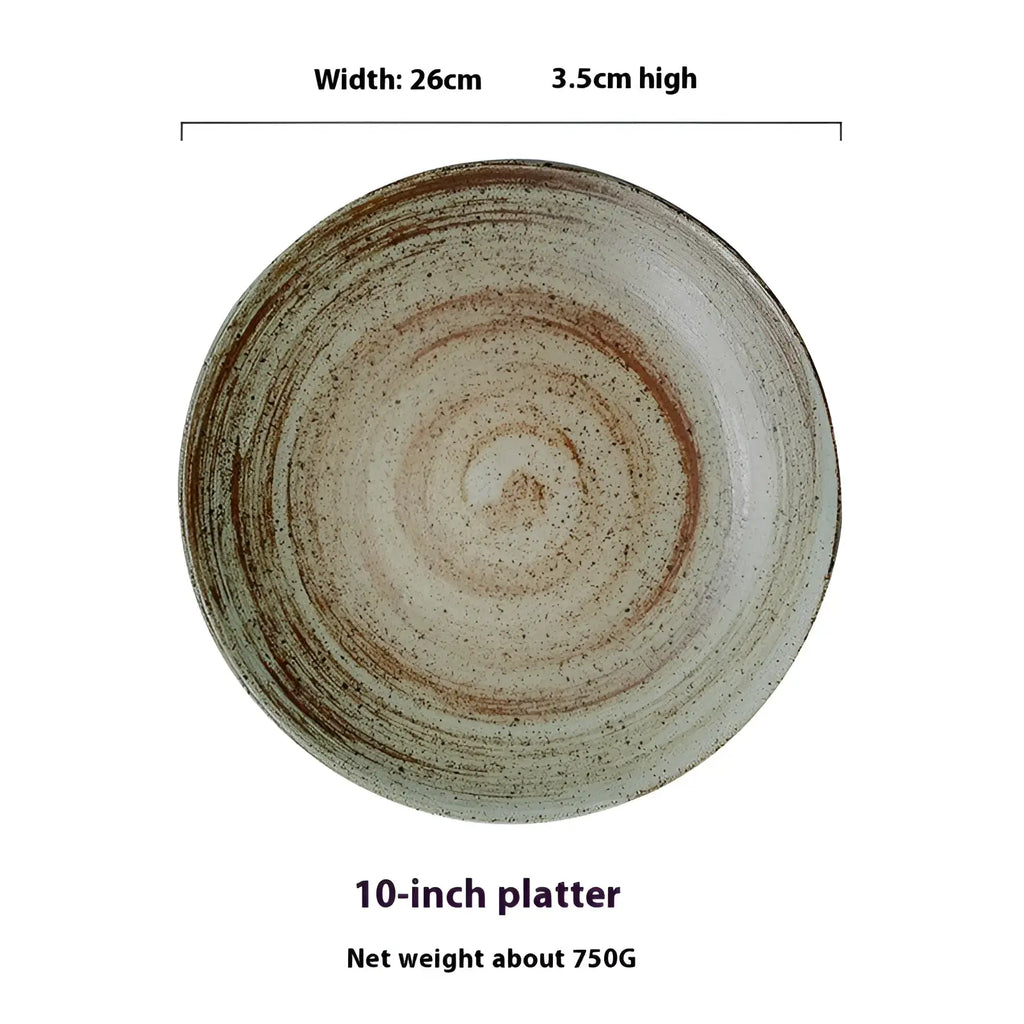 A rustic ceramic 10-inch platter with textured earthy glaze and concentric rings in muted brown and gray