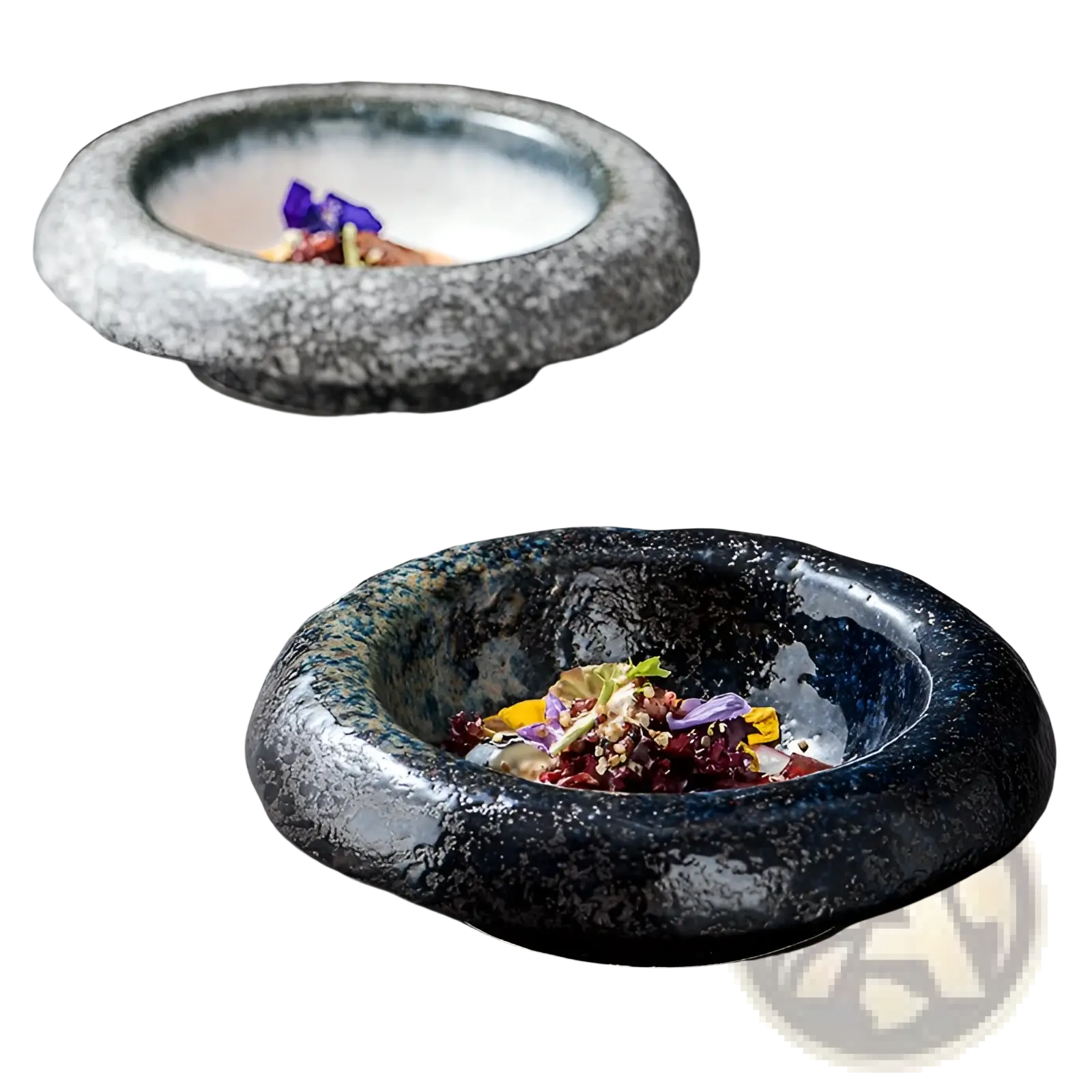 Rough-textured ceramic sashimi bowls with retro speckled black and gray glazes holding colorful garnished dishes