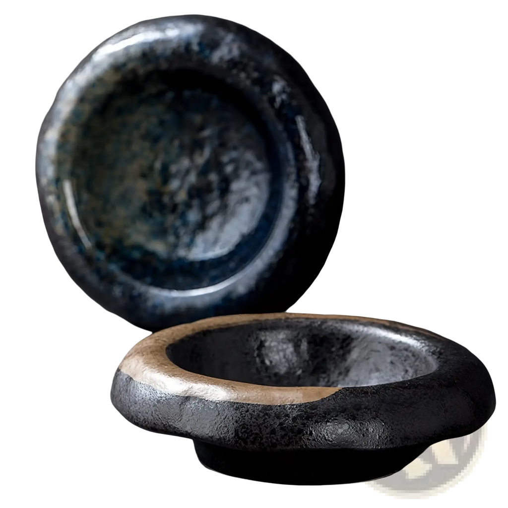 Ceramic sashimi bowl with dark textured speckled glaze and contrasting gold toned rim ideal for serving hat plate dishes