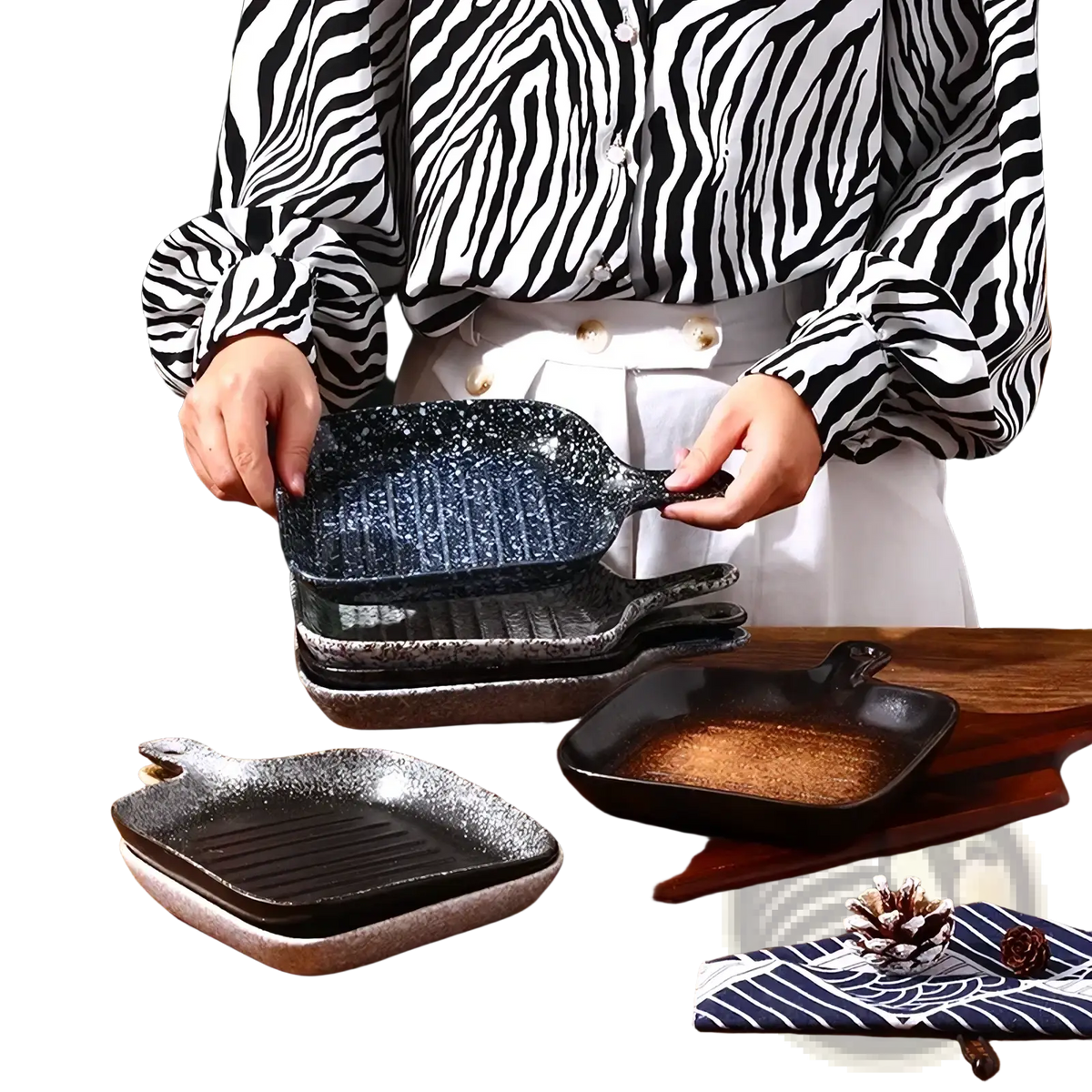 Black speckled ceramic square baking plate with handle featuring a textured ribbed cooking surface for grilling