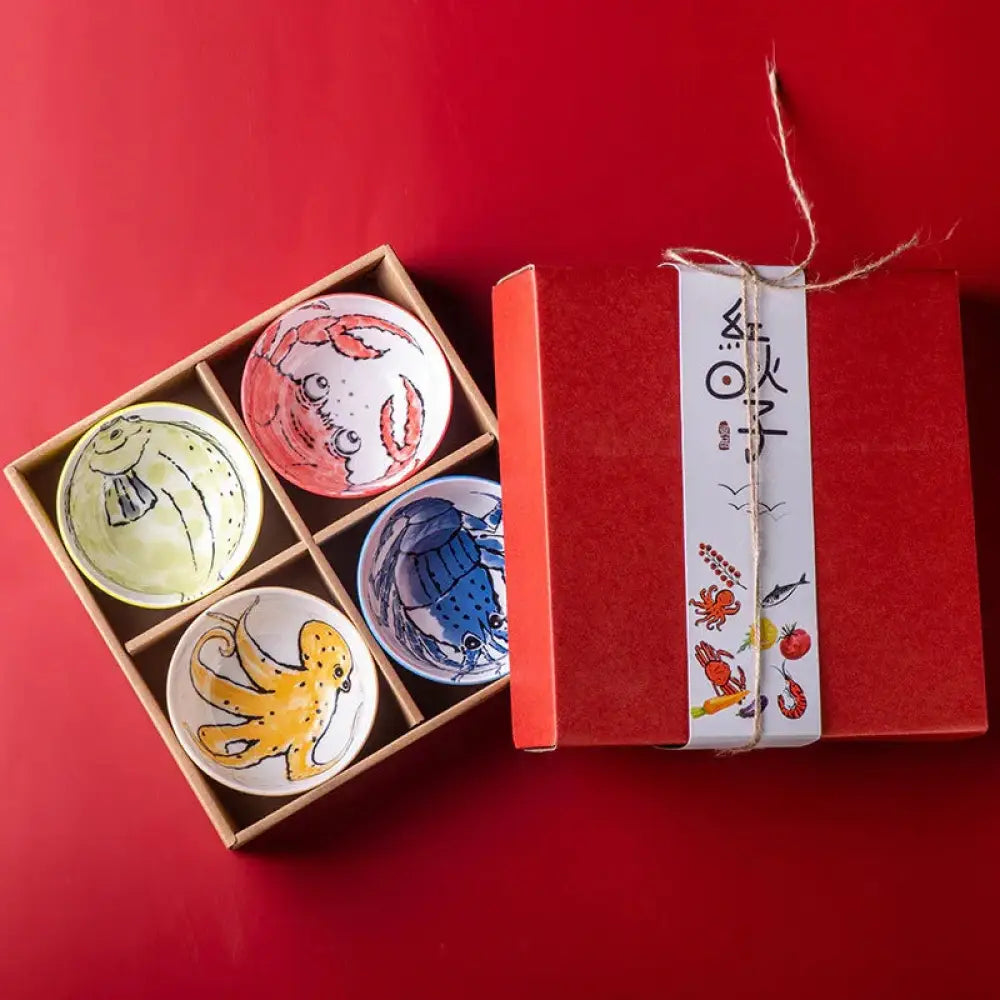 Hand-painted marine ceramic bowl gift set with colorful sea creatures in a wooden box with red packaging