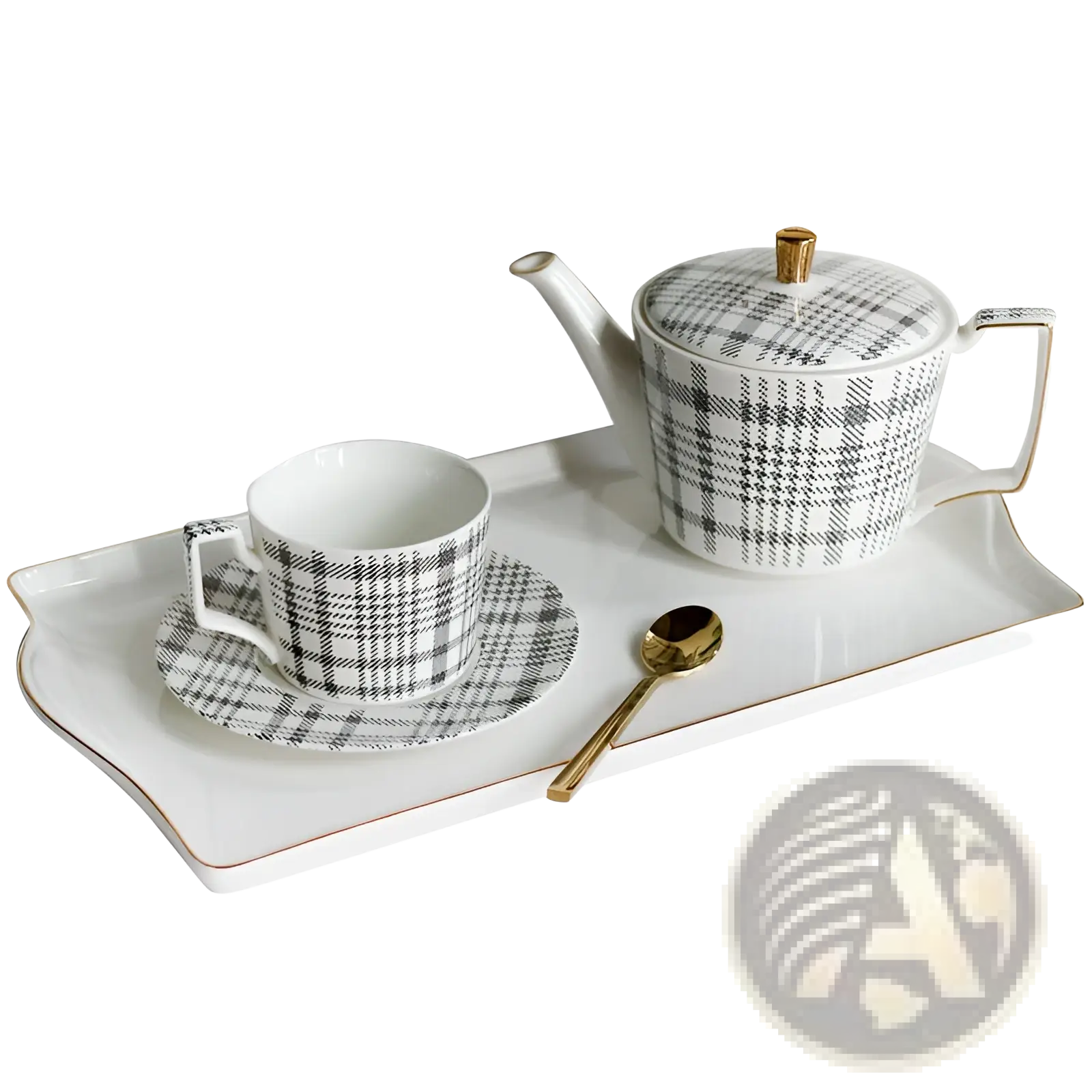 White ceramic teapot with black and gray plaid pattern and gold-trimmed lid knob and handle in ceramic tea set