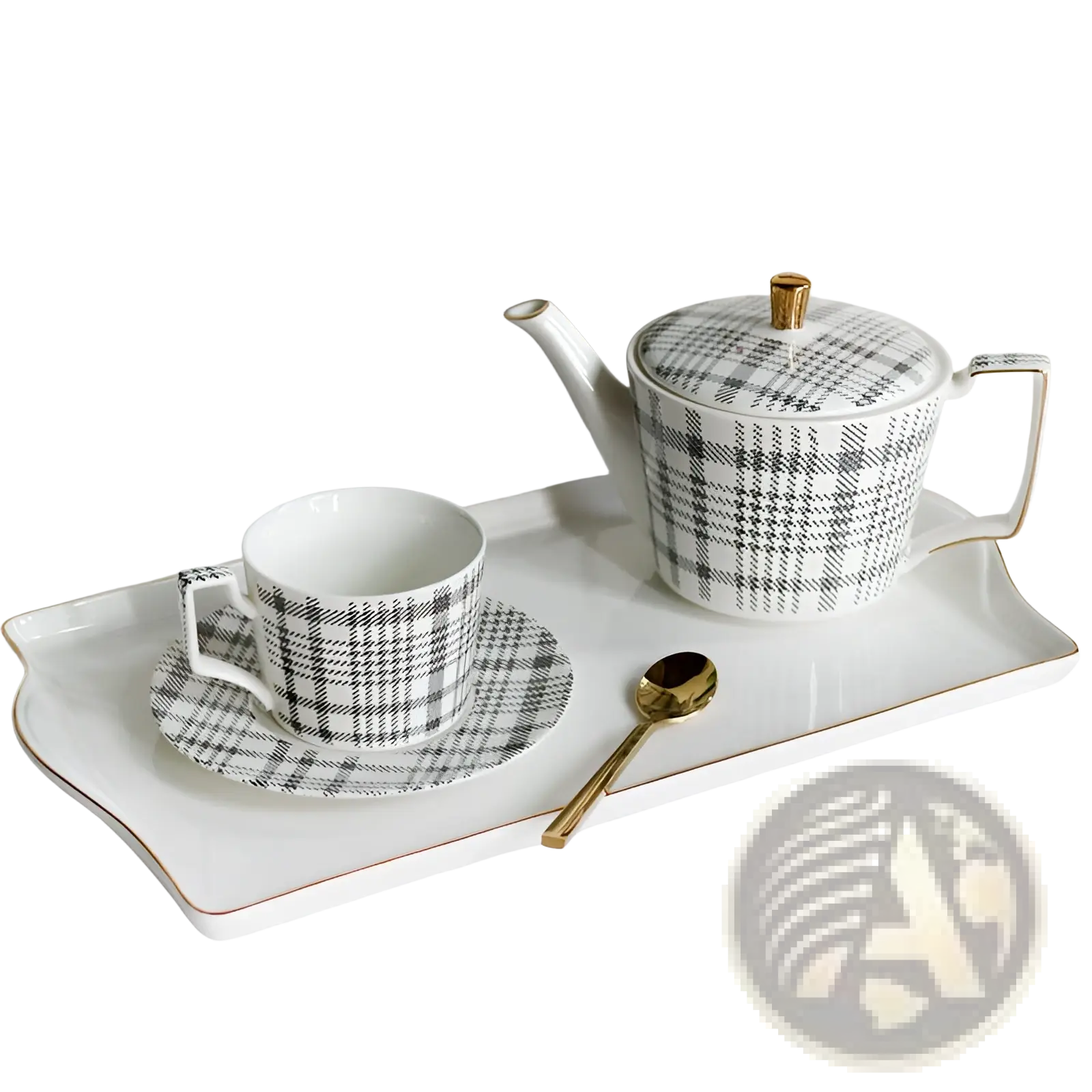 A white ceramic teapot with black and gray plaid pattern and gold-trimmed handle and lid knob in a tea set