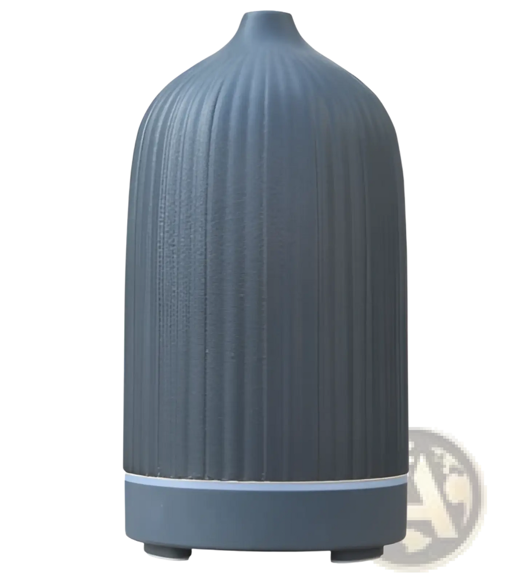 Gray ceramic ultrasonic aroma diffuser and humidifier with vertical ridges and a sleek rounded design