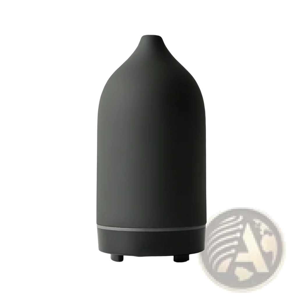 A sleek matte black ceramic ultrasonic aroma diffuser and humidifier with a teardrop shape and silver accent ring