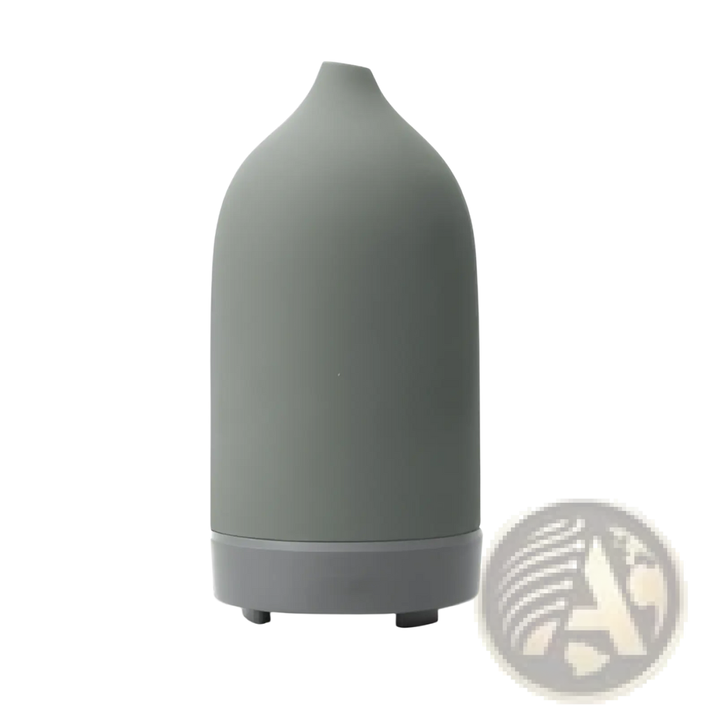 A sleek matte gray ceramic ultrasonic aroma diffuser and humidifier with a rounded bottle-like shape and wider base