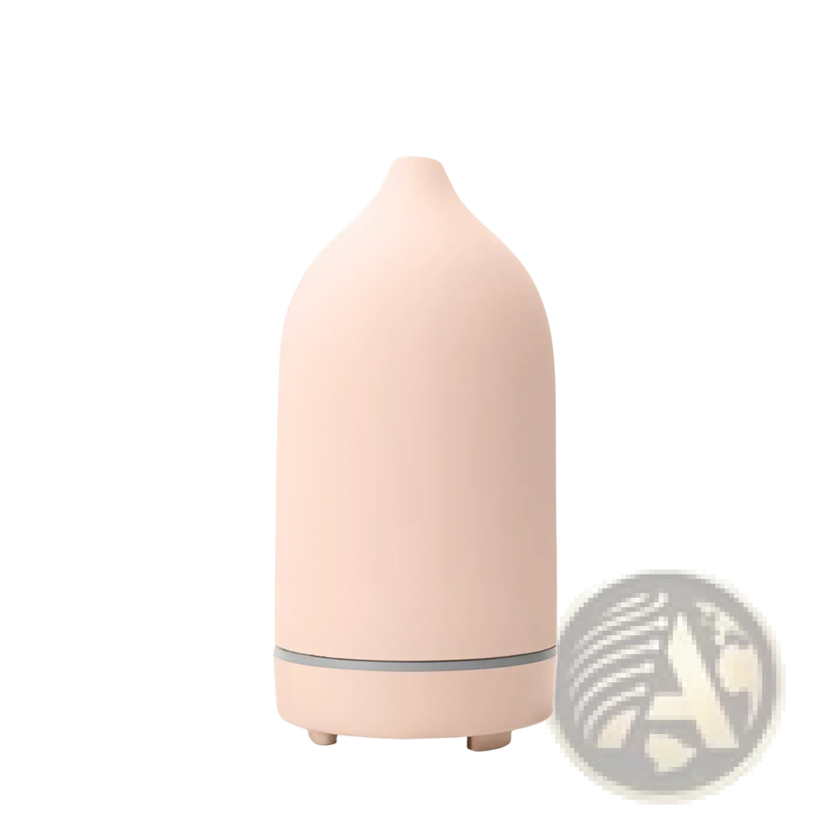 A blush-pink ceramic ultrasonic aroma diffuser and humidifier with minimalist design and gray accent band