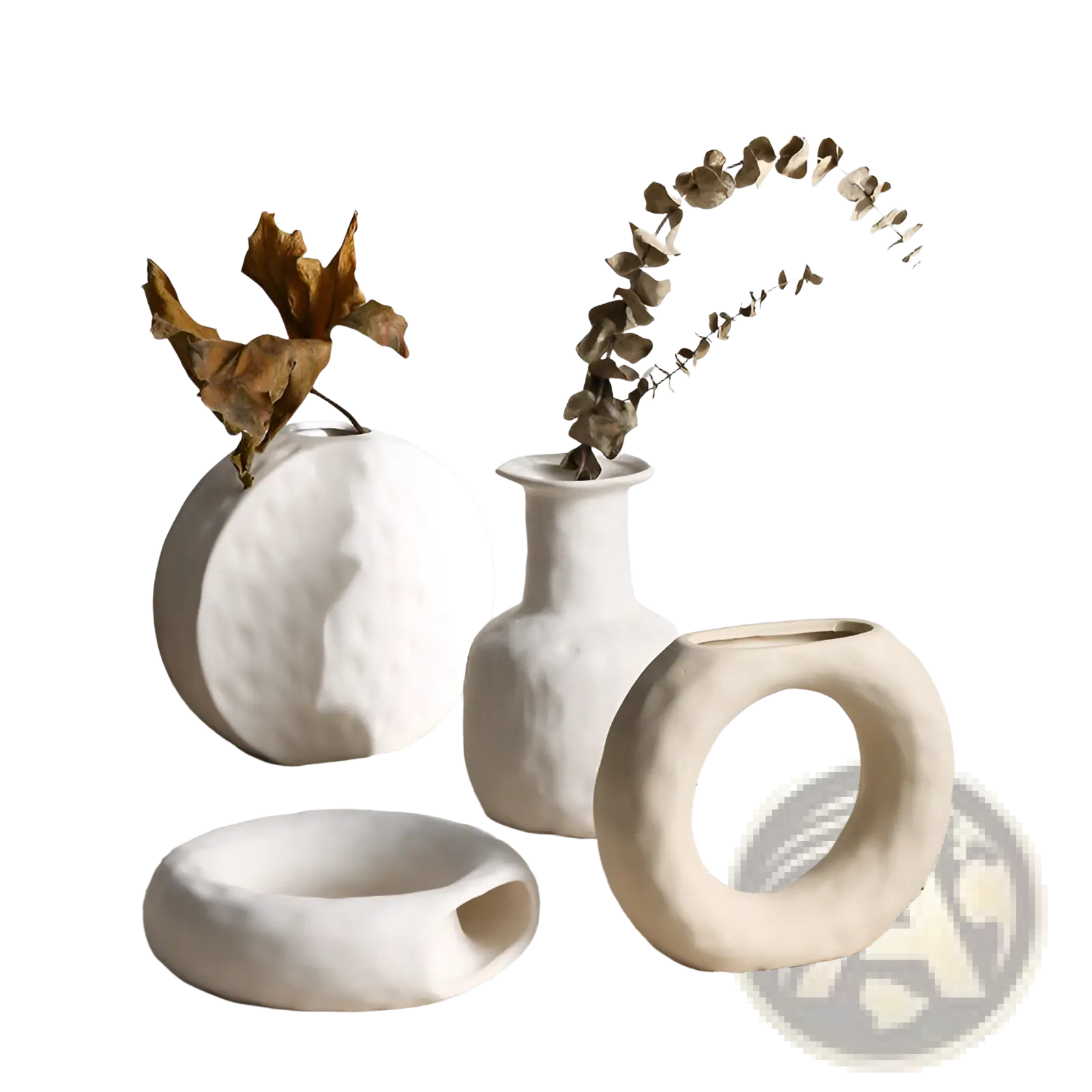 White ceramic vases with textured organic shapes and matte finishes in a minimalist scandinavian pottery style