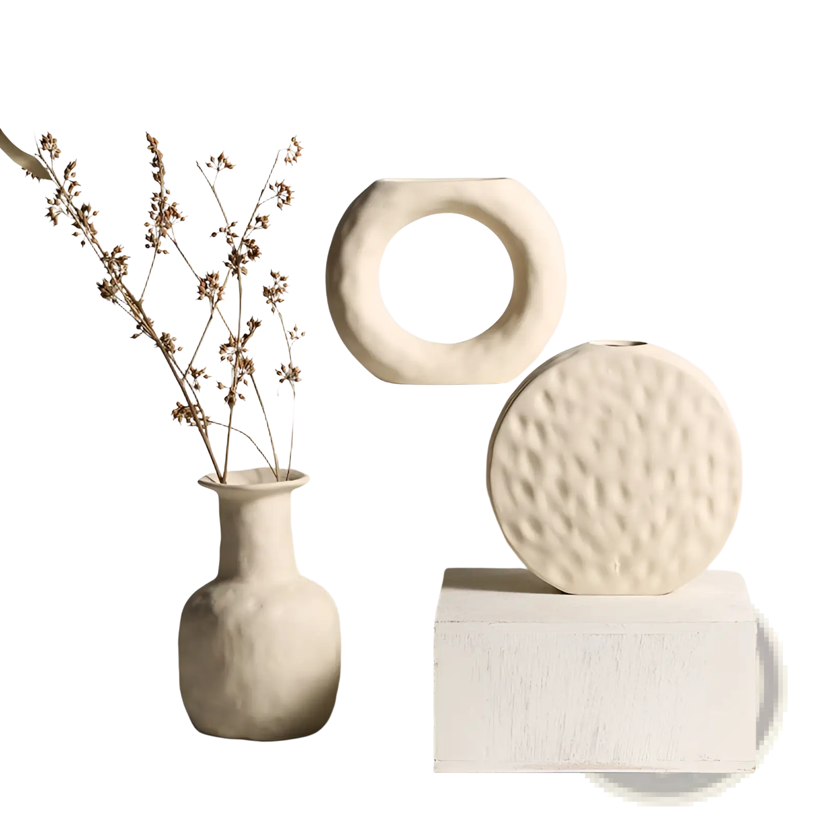 Cream-colored ceramic vases with minimalist Scandinavian textured pottery and organic handcrafted shapes