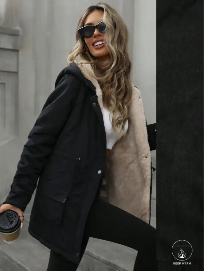 black hooded coat sherling lined zip up parka with beige shearling lining visible on collar and interior