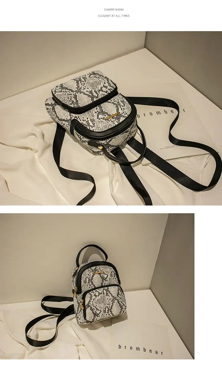 A compact black and white snake-print mini backpack featuring a sleek modern design in korean style.