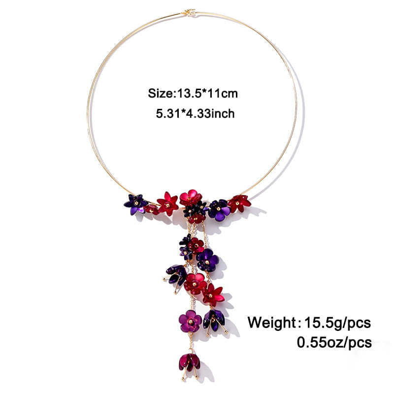 A gold layered choker necklace featuring delicate gold-toned metal with cascading red and purple acrylic floral charms.