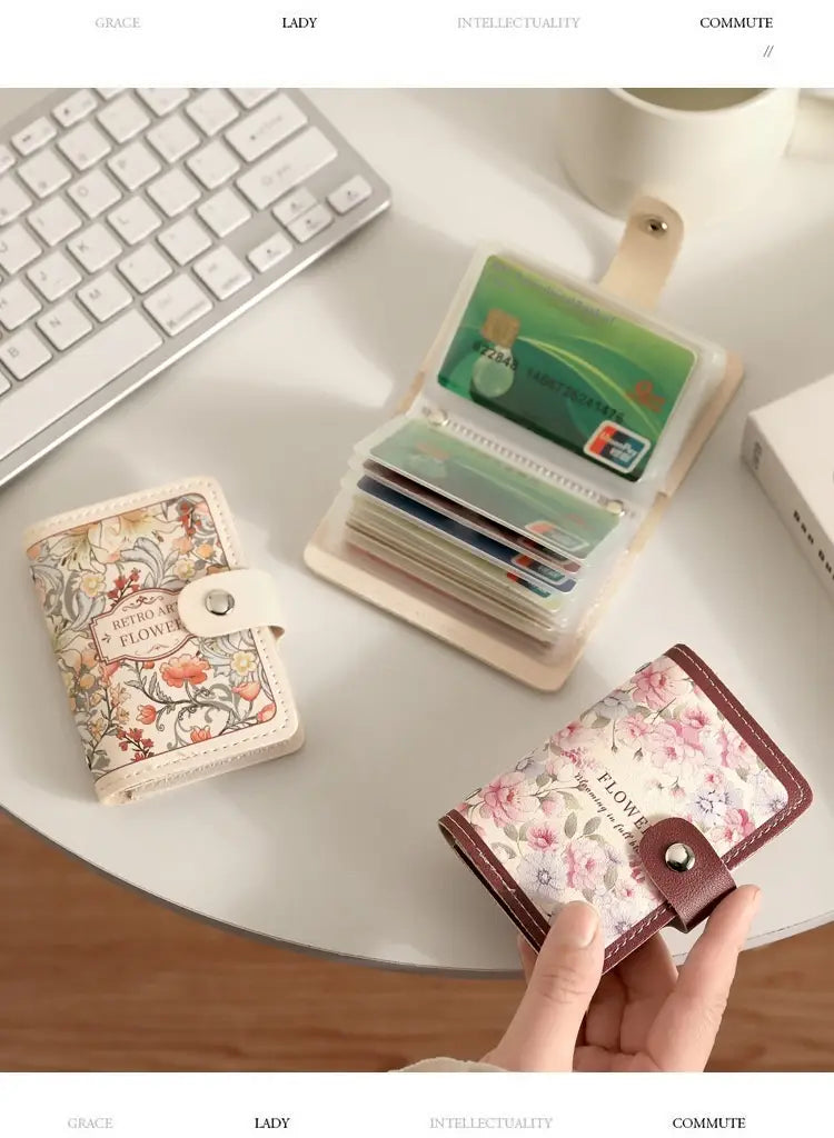 Vintage floral leather card holder wallet featuring a floral-patterned mini wallet with a brown leather flap and silver-toned snap closure.