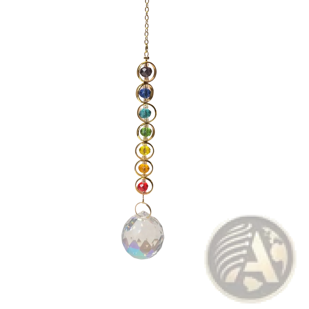 Chakra rainbow crystal sun catcher features a gold-toned chain with seven colorful faceted beads above a clear prism