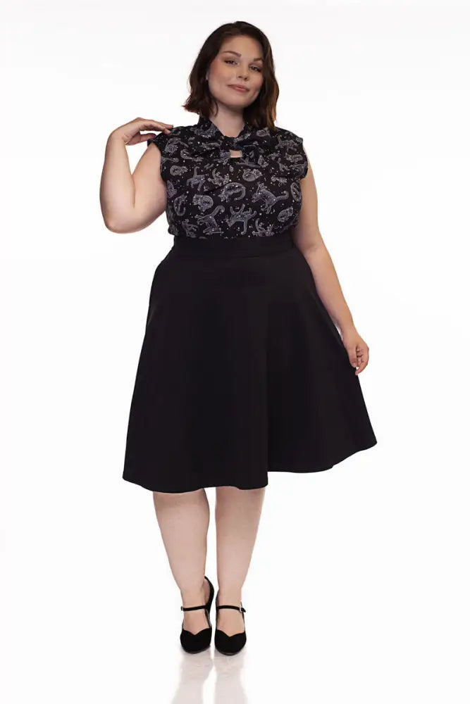 Charlotte Nova black high waisted pleated ponte a-line skirt with flared hem in a front view
